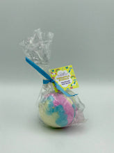 Load image into Gallery viewer, Daisy Rainbow Pineapple Sparkle Bath Bomb in compostable film wrapper
